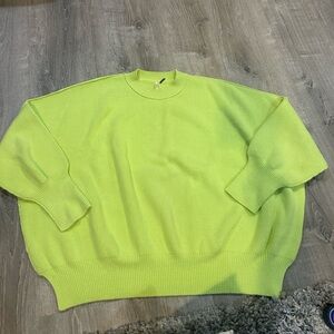 Free People Lime Green Women's Sweater size large with slit on side